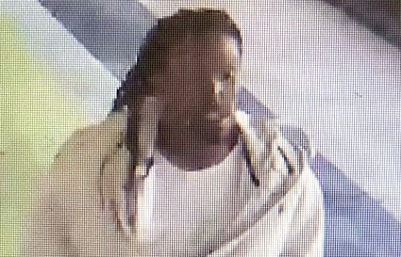 Sedrick T. Stevenson, seen here on Port of Seattle video cameras, boarded a light rail train headed north. Sound Transit security further confirmed the subject was later seen departing the Capitol Hill station. (Courtesy of Port of Seattle)