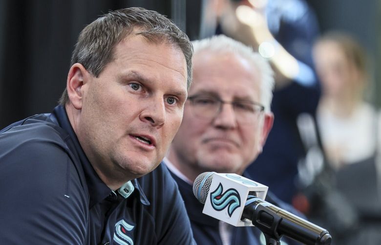 Jason Botterill, left, Executive VIce President and General Manager, fields a question with Tod Leiweke, CEO, looking on during a press conference Tuesday afternoon at Kraken Community Iceplex in Seattle, Washington, on April 22, 2025. 229859