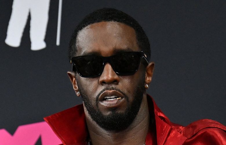 US producer-musician Sean “Diddy” Combs poses with the Global Icon award in the press room during the MTV Video Music Awards at the Prudential Center in Newark, New Jersey, on Sept. 12, 2023. (Angela Weiss/AFP via Getty Images/TNS) 141812607W 141812607W