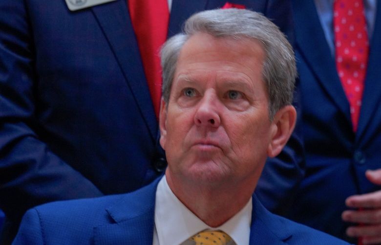 Georgia Gov. Brian Kemp signs legislation into law addressing eduction and school safety policies at the state Capitol on Monday, April 28, 2025, in Atlanta. (Matthew Pearson/WABE via AP) GAABE102 GAABE102