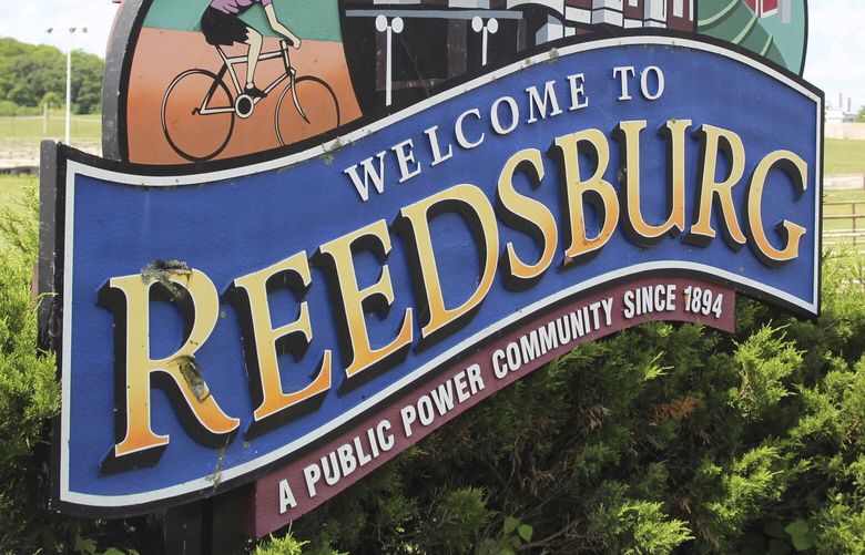 A welcome sign stands at the entrance of the city of Reedsburg, Wis., in July 2020. (Erica Dynes/Reedsburg Times-Press via AP) WIMAW101 WIMAW101