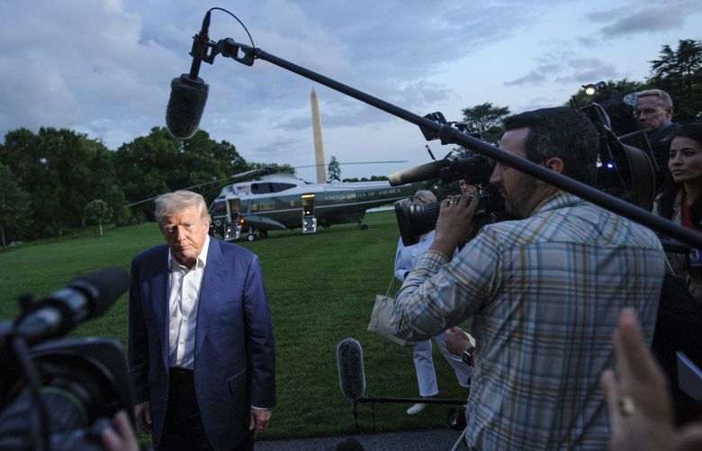 President Donald Trump speaks with reporters after disembarking Marine One upon arrival on the South Lawn of the White House in Washington, Sunday, May 4, 2025. (AP Photo/Rod Lamkey, Jr.) DCRL151 DCRL151