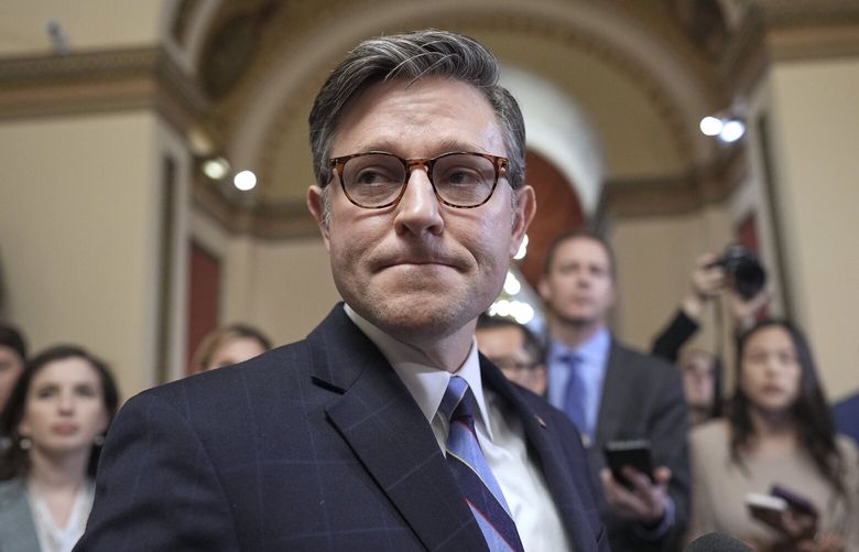 FILE – Speaker of the House Mike Johnson, R-La., talks to reporters just after House Republicans narrowly approved their budget framework, at the Capitol in Washington, April 10, 2025. (AP Photo/J. Scott Applewhite, File) WX201 WX201