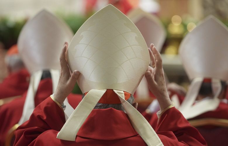 Cardinals attend a mass on the fifth of nine days of mourning for late Pope Francis, in St. Peter’s Basilica at the Vatican, Wednesday, April 30, 2025. (AP Photo/Alessandra Tarantino) XAC128 XAC128