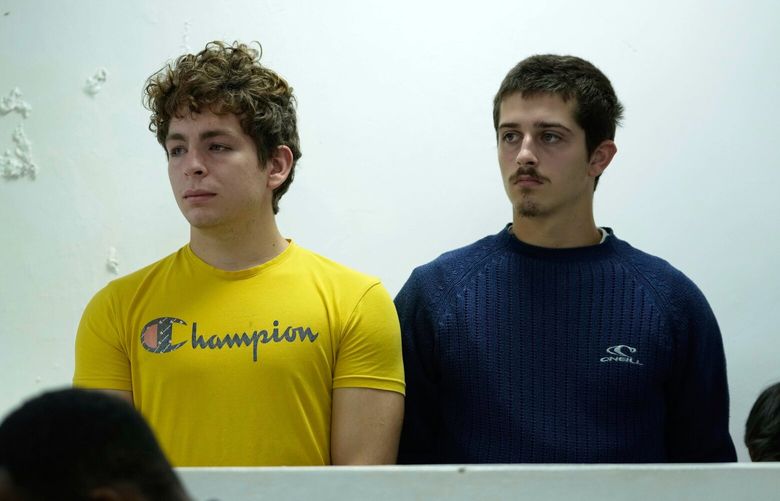 Belgian nationals Lornoy David, left, and Seppe Lodewijckx appear at the Jomo Kenyatta International Airport Law Courts in Nairobi, Kenya Wednesday, May 7, 2025. (AP Photo/Brian Inganga) KBI101 KBI101