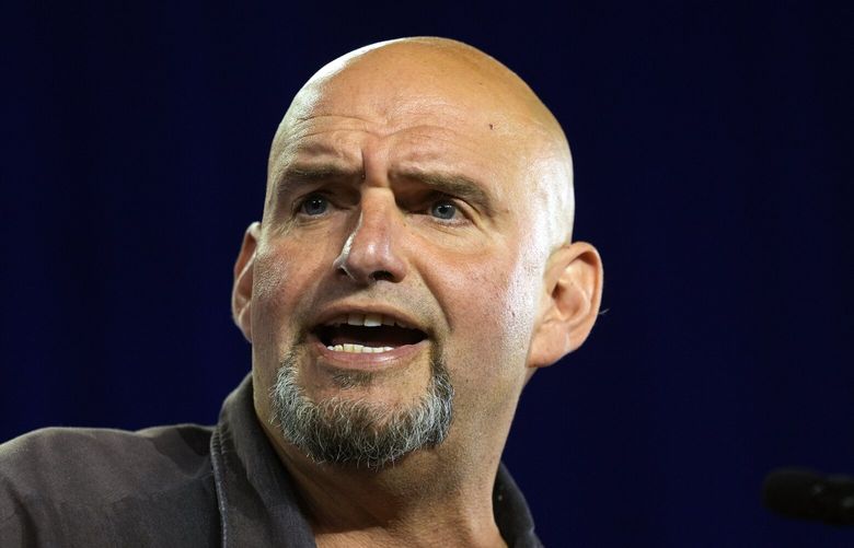 FILE – Sen. John Fetterman, D-Pa., speaks ahead of Democratic vice presidential candidate Minnesota Gov. Tim Walz during a campaign event in York, Pa, Oct. 2, 2024. (AP Photo/Matt Rourke, File) WX124 WX124