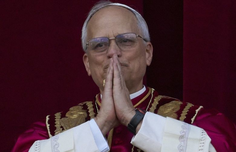 Newly elected Pope Leo XIV appears at the balcony of St. Peter’s Basilica at the Vatican, Thursday, May 8, 2025. (AP Photo/Andrew Medichini) AJM102 AJM102