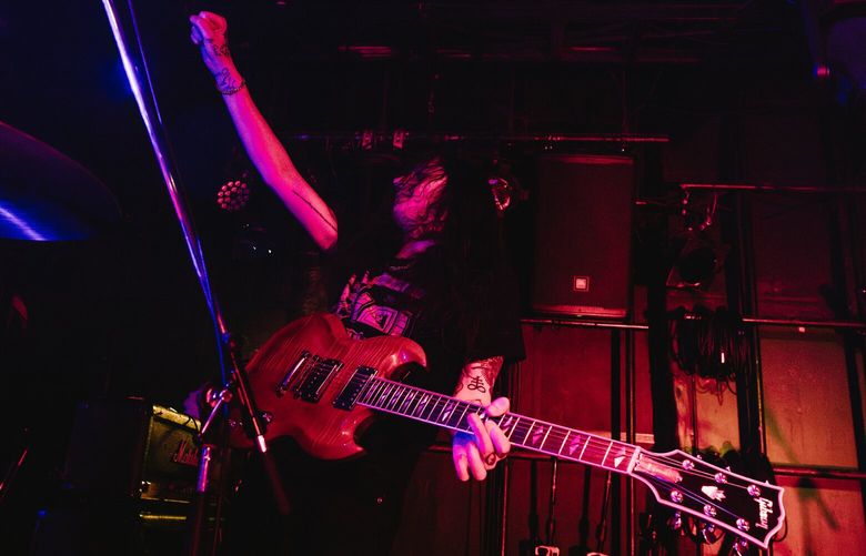 Fall of Troy singer and guitarist Thomas Erak performing live in Tokyo, Japan, in February 2025.