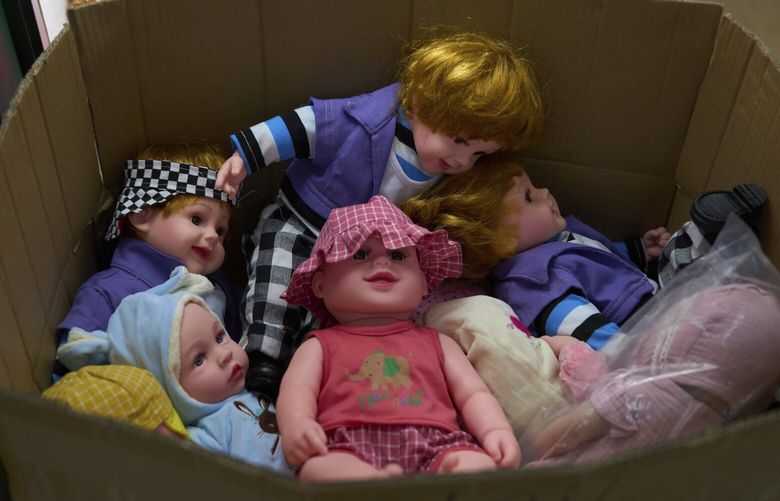 FILE -Dolls are packed in a carton at the Yiwu International Trade Market in Yiwu, eastern China’s Zhejiang province, Thursday, April 10, 2025. (AP Photo/Ng Han Guan, File) NYBZ602 NYBZ602