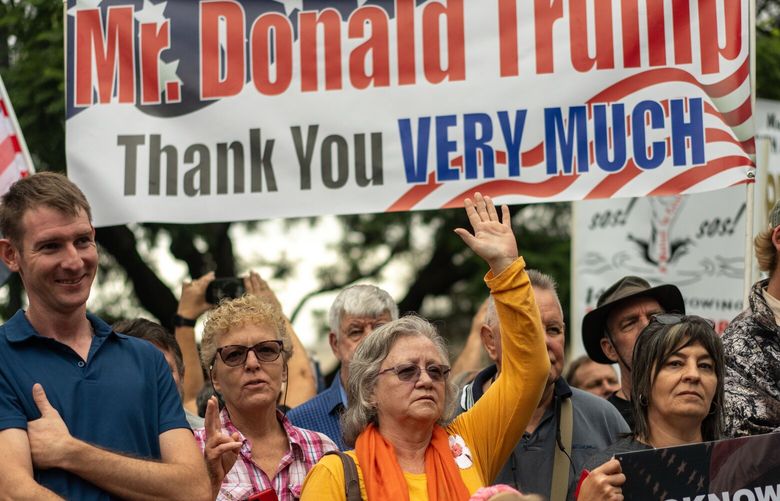 FILE – White South Africans rally outside the U.S. embassy in Pretoria, South Africa, Feb. 15, 2025. The Trump administration is working to bring the first group of white South Africans it has classified as refugees to the United States – a move that stands in stark contrast to the virtual shutdown of all other refugee admissions. (Joao Silva/The New York Times)