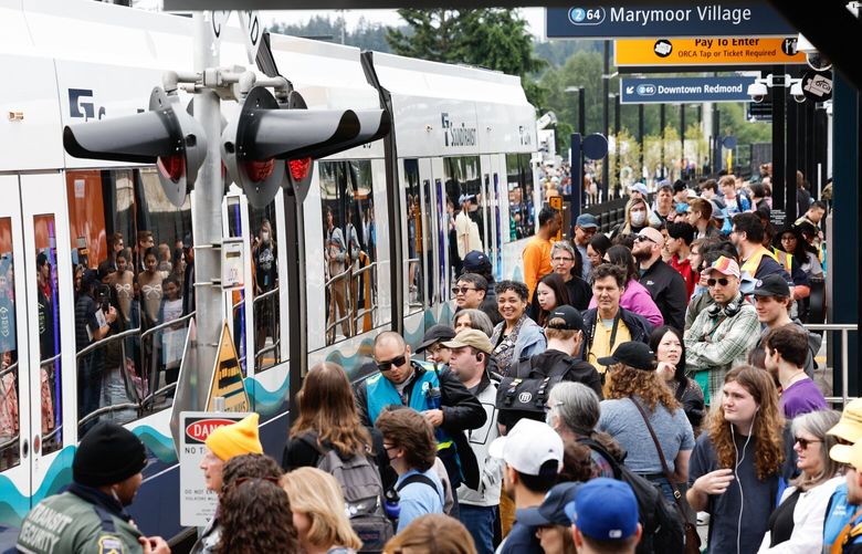 Crowds line the platform at Marymoor Village Station on opening day of the Sound Transit 2 Line extension on Saturday, May 9, 2025. 230033