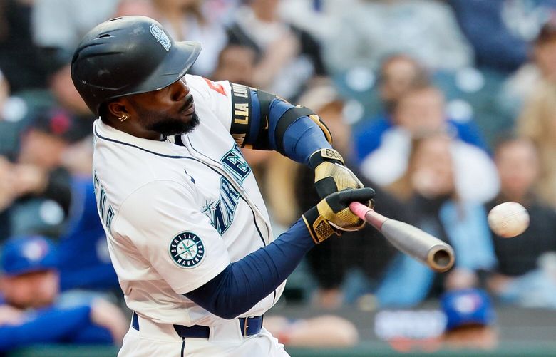 Seattle Mariners left fielder Randy Arozarena connects on a RBI double during the fourth inning Saturday, May 10, 2025 in Seattle. 230026