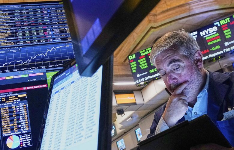 Trader Edward McCarthy works on the floor of the New York Stock Exchange, Thursday, May 8, 2025. (AP Photo/Richard Drew) NYRD413 NYRD413