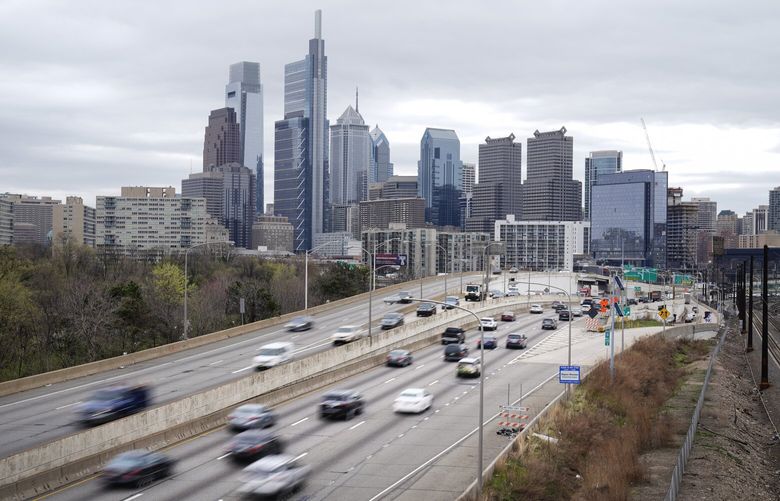 FILE – Motor vehicle traffic moves along the Interstate 76 highway in Philadelphia, Wednesday, March 31, 2021.  (AP Photo/Matt Rourke, File) NY108 NY108