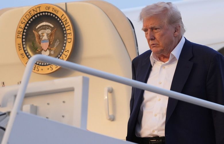 President Donald Trump arrives on Air Force One at Joint Base Andrews, Md., Sunday, May 4, 2025. (AP Photo/Manuel Balce Ceneta) MDJE323 MDJE323