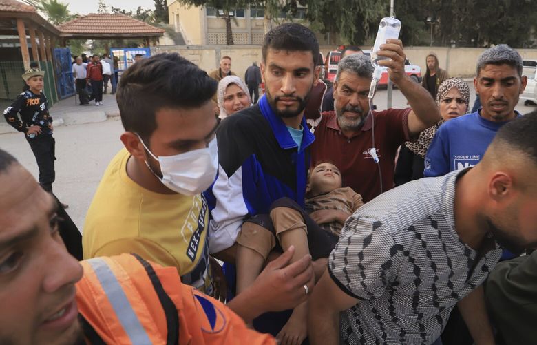 Palestinians evacuate patients from the European hospital in Khan Younis, Gaza, after it was hit by an Israeli army airstrike, Tuesday, May 13, 2025. The Israeli military said it had carried out a strike targeting what it said was a Hamas “command and control center” located beneath the hospital. (AP Photo/Mariam Dagga) XOB117 XOB117
