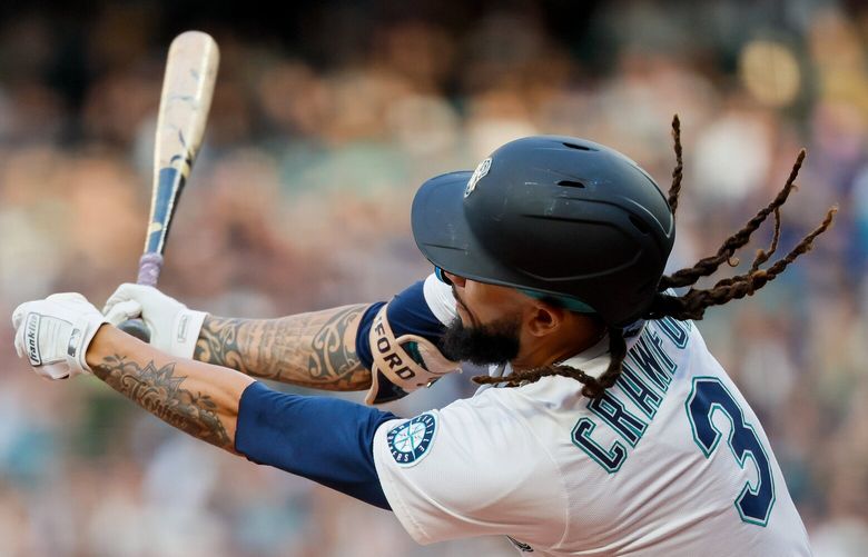 Seattle Mariners shortstop J.P. Crawford swings at a pitch during the third inning Saturday, May 10, 2025 in Seattle. 230026
