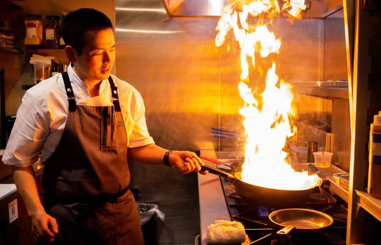 Paju Head Chef and Owner Bill Jeong makes Paju Fried Rice in the restaurant’s new location in South Lake Union Seattle on Friday, July 26, 2024.  227618