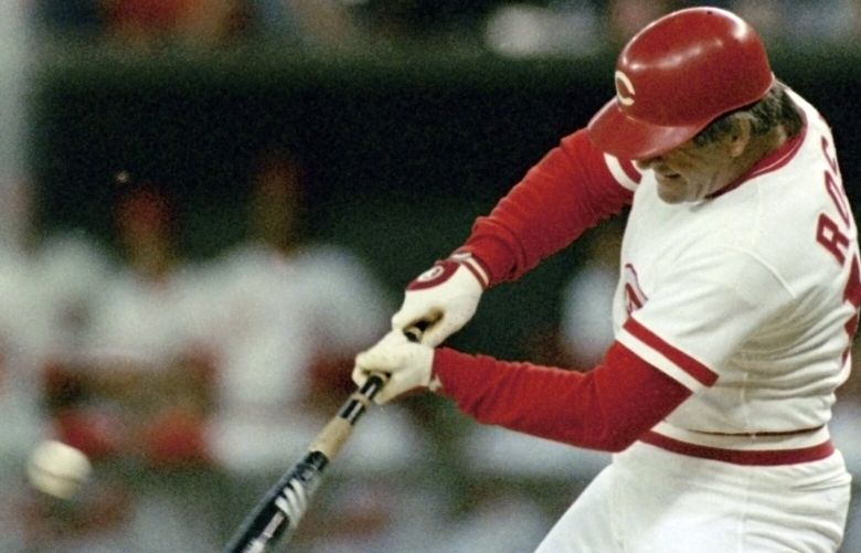 FILE – In this Sept. 11, 1985, file photo, Cincinnati Reds Pete Rose connects for hit number No. 4,192 break Ty Cobb’s all time hitting record at Riverfront Stadium Cincinnati. The bat Rose used to become baseball’s career hits leader is up for auction. The Lelands.com auction runs through Oct. 27, and the starting bid is $100,000. (AP Photo/Steve Pyle, File) NY187