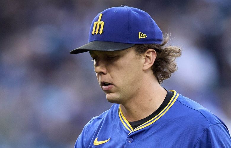 Seattle Mariners starting pitcher Logan Gilbert walks off the field after the second inning against the Miami Marlins of a baseball game, Friday, April 25, 2025, in Seattle.