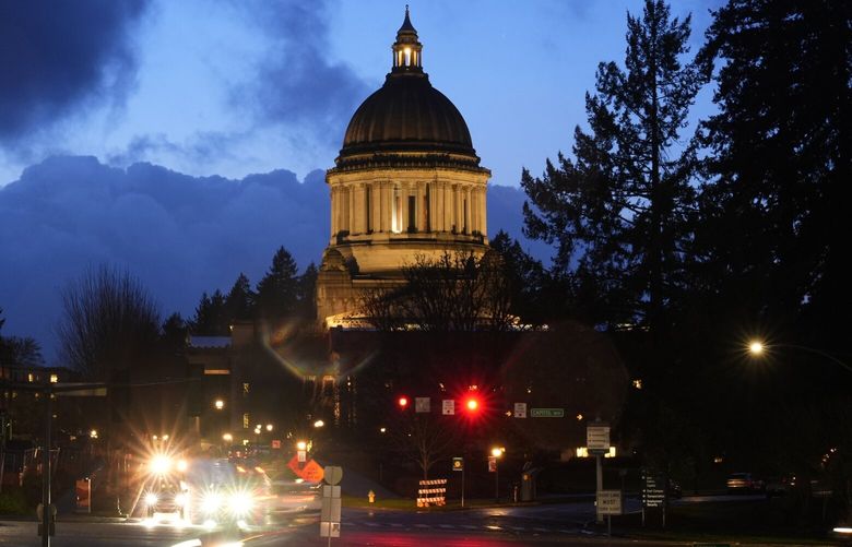 FILE – The Washington state Capitol building is pictured, Tuesday, Jan. 9, 2024, in Olympia, Wash. King County Superior Court Judge Michael Scott on Friday, June 21, 2024, has paused parts of a new Washington state parental rights law derided by critics as a “forced outing” measure. (AP Photo/Lindsey Wasson, File)