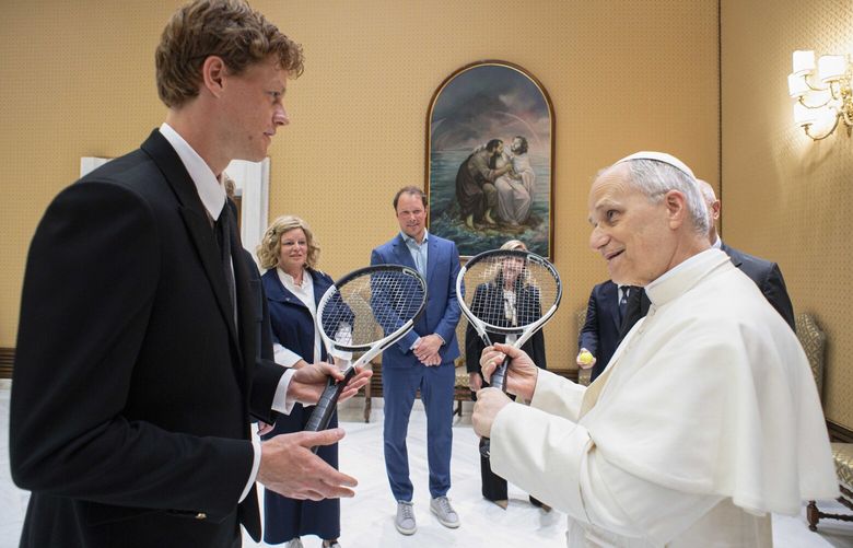 Italy’s Jannik Sinner, left, shares a light moment with Pope Leo XIV on the occasion of their meeting at the Vatican, Wednesday, May 14, 2025. (Vatican Media via AP) LBL106 LBL106