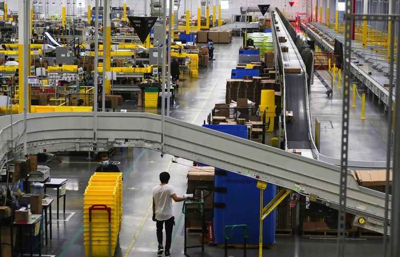 Inside Amazon’s Kent fulfillment center, a showpiece for the company’s coronavirus response, Thursday, June 11, 2020.
 214215