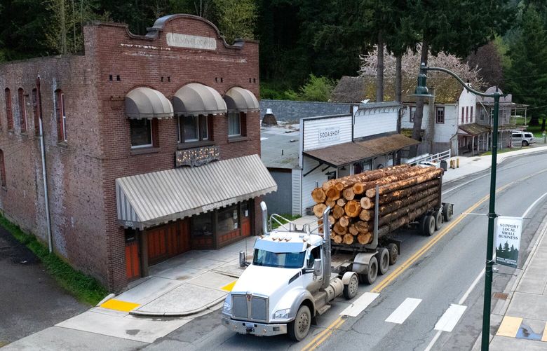 A logging truck rolls through Wilkeson on Tuesday, April 29, 2025.