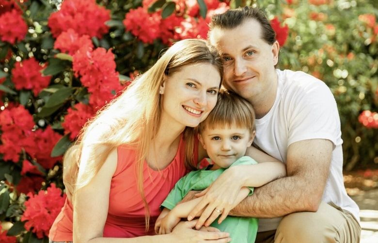 Oleksander (Alex) and Olga Martynenko pictured with their son, Daniel.