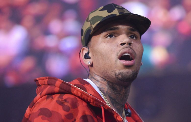 FILE – In this June 7, 2015 file photo, Chris Brown performs at the 2015 Hot 97 Summer Jam at MetLife Stadium in East Rutherford, N.J. (Photo by Scott Roth/Invision/AP, File) NYPS206 NYPS206