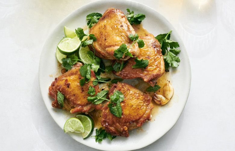 Crispy chicken with lime butter. Let the chicken cook itself, then turn the drippings into a savory lime butter sauce, Eric Kim writes. Food styled by Simon Andrews. (David Malosh/The New York Times)