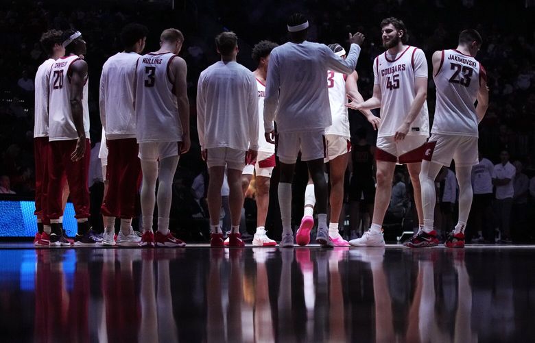 Washington State players are introduced before an NCAA college basketball game against Stanford in the quarterfinal round of the Pac-12 tournament Thursday, March 14, 2024, in Las Vegas. (AP Photo/John Locher)