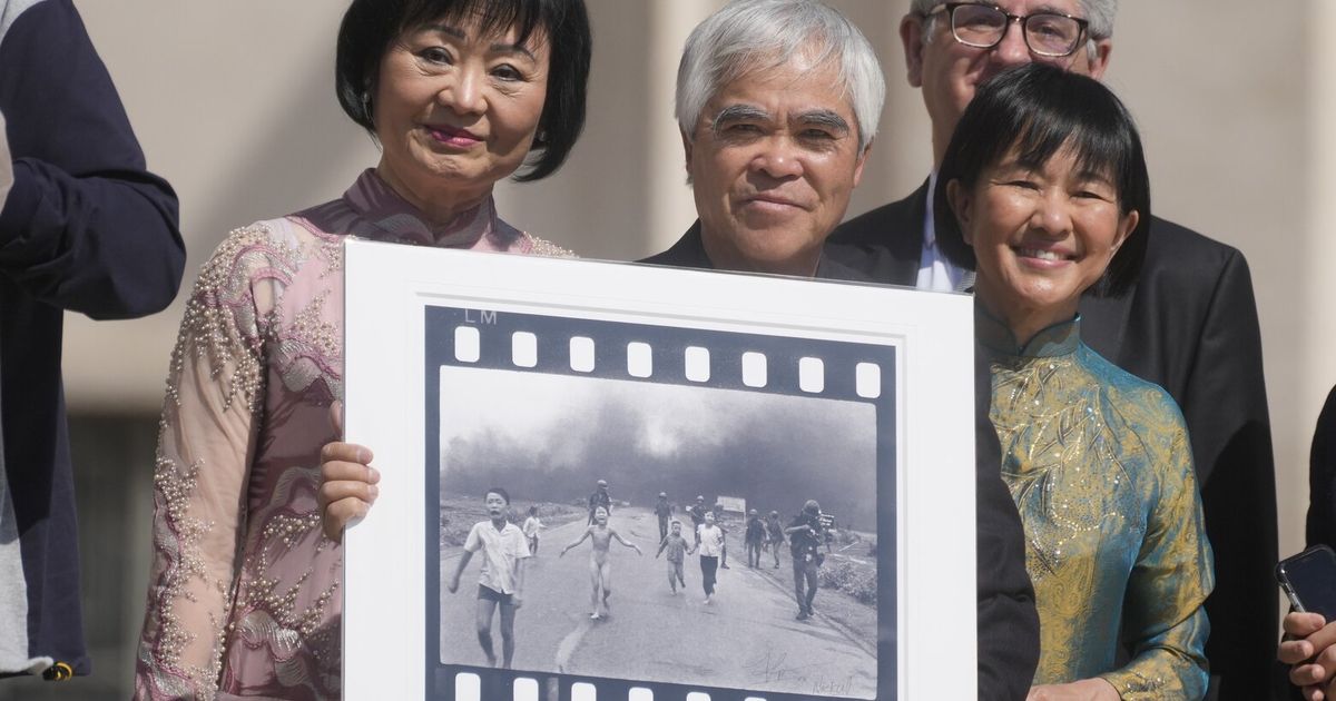 Photo group says it has ‘suspended attribution’ of historic Vietnam picture because of doubts