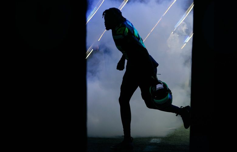 Seattle Seahawks cornerback Riq Woolen comes out of the tunnel before the start of a game against the Philadelphia Eagles Monday, Dec. 18, 2023 in Seattle. 225732