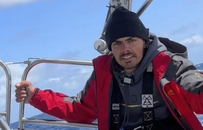 In this screengrab taken from a video posted on Oliver Widger’s Instagram account on Sunday, May 4, 2025, Widger talks to the camera somewhere in the Pacific Ocean as he and his cat, Phoenix, sail from Oregon to Hawaii. (Oliver Widger via AP) HOPO401 HOPO401