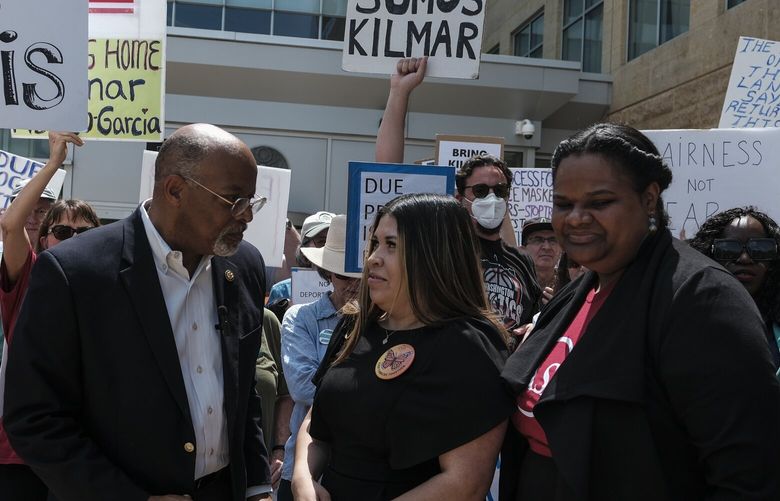 Jennifer Vasquez Sura, wife of Kilmar Abrego García, speaks with Rep. Glenn Ivey (D-Maryland) on Friday outside U.S. District Court in Greenbelt, Maryland. Michael A. McCoy/For The Washington Post