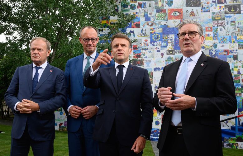 From left, Poland’s Prime Minister Donald Tusk, Germany’s Chancellor Friedrich Merz, France’s President Emmanuel Macron and Britain’s Prime Minister Keir Starmer talk to the press after their meeting Friday May 16, 2025 in Tirana, Albania. (Leon Neal/Pool via AP) LFP114 LFP114