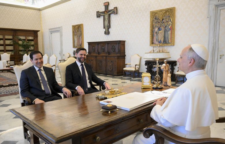 Pope Leo XIV meets with Vice President JD Vance, center, and Secretary of State Marco Rubio, left, on the occasion of their meeting at the Vatican, Monday, May 19, 2025. (Vatican Media via AP) XVAT102 XVAT102