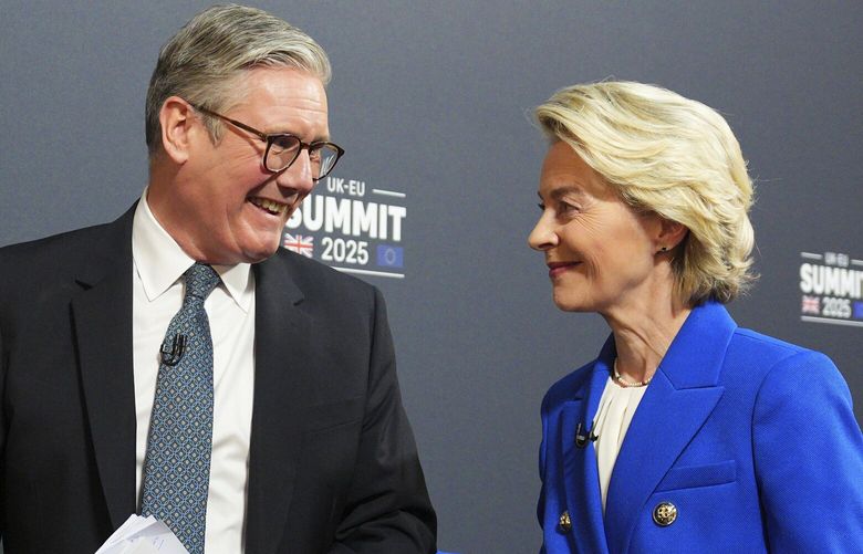 Britain’s Prime Minister Keir Starmer, left, and European Commission President Ursula von der Leyen smile as they leave at the end of a joint press conference with European Council President Antonio Costa following a United Kingdom and European Union summit at Lancaster House, London, Monday, May 19, 2025. (Carl Court/Pool Photo via AP) lbl123 lbl123