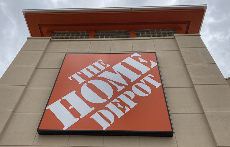FILE – A Home Depot logo sign hands on its facade, Friday, May 14, 2021, in North Miami, Fla. (AP Photo/Wilfredo Lee, File) XPAG204 XPAG204