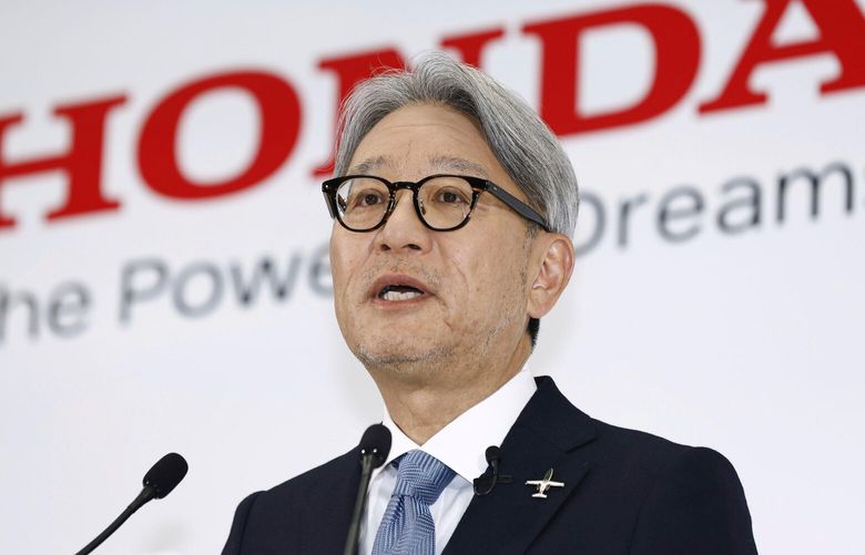 Honda Chief Executive Toshihiro Mibe speaks during a news conference in Tokyo, Japan, Tuesday, May. 20, 2025. (Kyodo News via AP) KYD801 KYD801