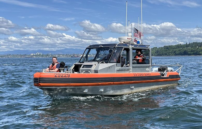 The U.S. Coast Guard rescued one person from a sinking boat in Possession Sound on Wednesday near Howarth Park in Everett. Three people remained missing. Police and firefighters were helping with the search. (Everett Fire Department)
