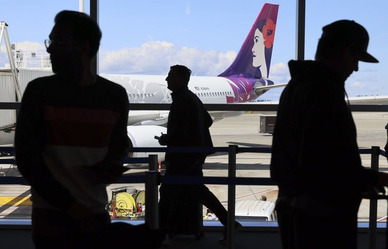Customers line up to board Alaska’s inaugural trans-Pacific flight to Tokyo Monday afternoon at Seattle-Tacoma International Airport in SeaTac, Washington on May 12, 2025. 230068