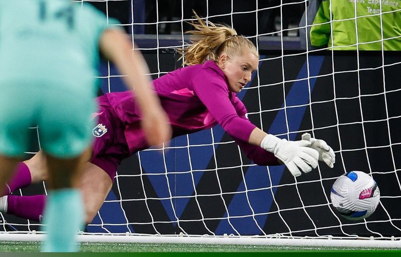 Seattle goalkeeper Claudia Dickey makes the save in the first half.  The Seattle Reign FC played the Kansas City Current in NWSL Soccer Friday, May 2, 2025 at Lumen Field, in Seattle, WA. 229852