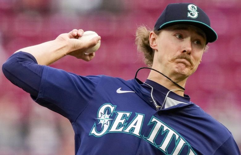 Seattle Mariners pitcher Bryce Miller throws in the first inning of a baseball game against the Cincinnati Reds, Wednesday, April 16, 2025, in Cincinnati.