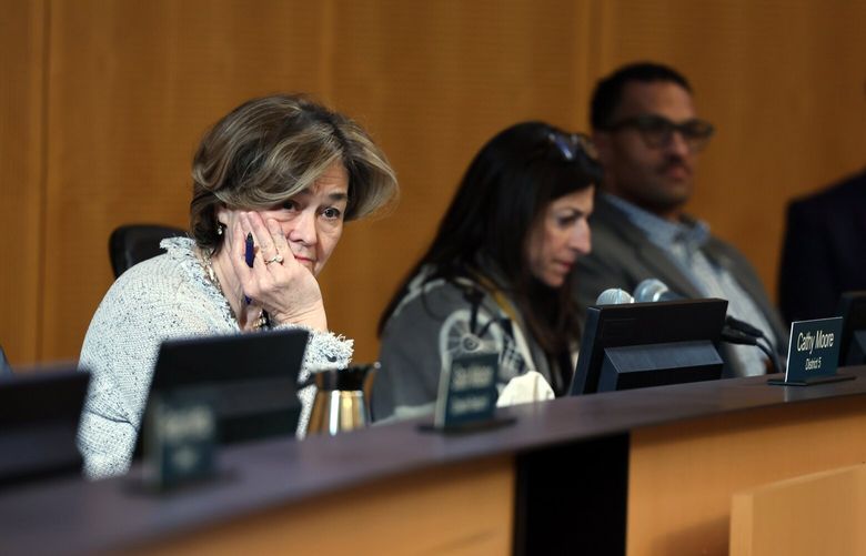 Cathy Moore listens to public comments befroe  the Seattle Council voting on crowd control ordinance that would allow Seattle Police Department at City Hall in downtown Seattle, Washington, February 11, 2025. 229298