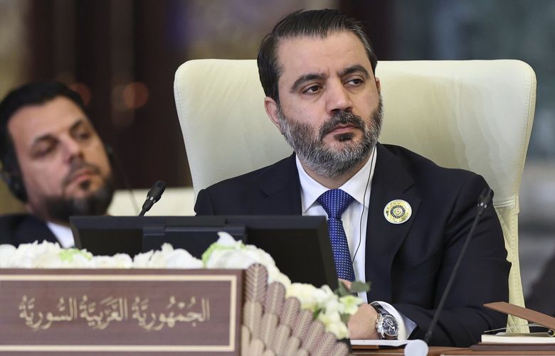Syrian Foreign Minister Asaad al-Shibani attends the 34th Arab League summit, in Baghdad, Iraq, Saturday, May 17, 2025. (Thaier Al-Sudani/Pool via AP) lbj141 lbj141