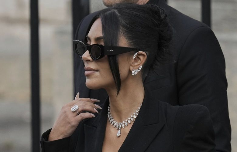 Kim Kardashian leaves the justice palace after testifying, regarding a robbery of millions of dollars in jewels from her Paris hotel room in 2016, in Paris, Tuesday, May 13, 2025. (AP Photo/Aurelien Morissard) XVM150 XVM150