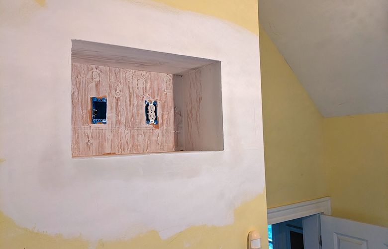 This new alcove high up in a central hallway is where the fiber optic cable terminates inside the author
