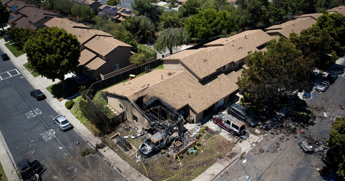 AP PHOTOS: Jet crashes into San Diego neighborhood, killing 3 and setting homes and vehicles on fire